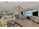 Bright living room with open kitchen and water views at 1915 Illinois Ave, Englewood, FL 34224