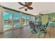 Enclosed patio offering views of the pool at 1915 Illinois Ave, Englewood, FL 34224