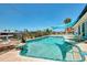 Sparkling backyard pool with ocean views and a tropical ambiance at 1915 Illinois Ave, Englewood, FL 34224