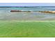 Breathtaking waterfront view showcasing the ocean landscape with small islands and clear turquoise water at 1915 Illinois Ave, Englewood, FL 34224
