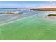 Scenic waterfront view showcasing the beautiful ocean landscape with small islands and clear turquoise water at 1915 Illinois Ave, Englewood, FL 34224