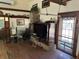 Spacious living area featuring exposed beams and stone accents at 1916 Myrtle Ave, Punta Gorda, FL 33950