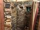 Modern shower design with stone wall at 1916 Myrtle Ave, Punta Gorda, FL 33950