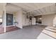 Spacious carport with direct home access, a refrigerator, and access to the backyard at 21070 Gertrude Ave, Port Charlotte, FL 33952