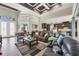 Inviting living area showcasing open layout, modern decor, and easy access to the kitchen and dining space at 27 Tee View Rd, Rotonda West, FL 33947