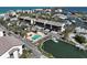 Aerial community shot with pool, waterfront, boat access and beach views at 2769 N Beach Rd # 205, Englewood, FL 34223