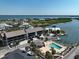 Desirable condo community showcasing a pool, gazebo, parking, and convenient waterway access at 2769 N Beach Rd # 205, Englewood, FL 34223