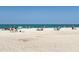 Beautiful beach scene with people relaxing by the sea and enjoying the sunny weather at 2769 N Beach Rd # 205, Englewood, FL 34223