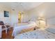 Inviting bedroom features twin beds, and a ceiling fan; with easy access to the bathroom at 2769 N Beach Rd # 205, Englewood, FL 34223