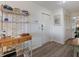 Condo foyer featuring wood floors, closet and entry table at 2769 N Beach Rd # 205, Englewood, FL 34223
