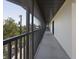 Condo hallway leading to unit and bike storage at 2769 N Beach Rd # 205, Englewood, FL 34223