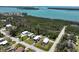 Aerial view of a lovely home on a large lot near the beautiful waterfront at 2906 Waterside Dr, Englewood, FL 34224