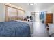 Bedroom featuring natural light, ceiling fan, and dresser at 2906 Waterside Dr, Englewood, FL 34224