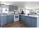 Corner kitchen featuring lots of storage space and a breakfast bar at 2906 Waterside Dr, Englewood, FL 34224