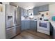 Well-equipped kitchen featuring stainless steel appliances and ample cabinet space at 2906 Waterside Dr, Englewood, FL 34224