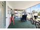 Inviting enclosed porch featuring comfortable seating and lots of sunlight at 2906 Waterside Dr, Englewood, FL 34224
