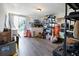 Bright storage room with lots of storage and sliding glass doors to the outside at 2906 Waterside Dr, Englewood, FL 34224
