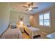 Charming twin bedroom featuring beach-themed decor and comfortable furnishings at 35 Medalist Rd, Rotonda West, FL 33947