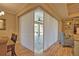 Open dining area with sliding doors view to screened-in lanai at 35 Medalist Rd, Rotonda West, FL 33947