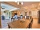 Open concept dining room leads to the living room and kitchen with coffered ceilings at 35 Medalist Rd, Rotonda West, FL 33947