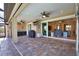 Spacious outdoor patio with kitchen, grill and plenty of room for seating at 35 Medalist Rd, Rotonda West, FL 33947