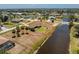 An aerial view of a charming single-Gathering home with waterfront views at 39 Bunker Pl, Rotonda West, FL 33947