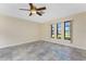 Bright living area features tile flooring and energy-efficient windows at 39 Bunker Pl, Rotonda West, FL 33947
