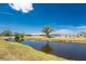 Scenic canal view showcasing waterfront living, mature trees, and neighborhood charm at 39 Bunker Pl, Rotonda West, FL 33947