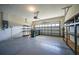 Spacious two-car garage with ample storage space and overhead door at 4004 Landor Ct, Venice, FL 34293