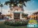Beautiful shot of the historic Venice Downtown welcome sign framed by flowers and palm trees at 4004 Landor Ct, Venice, FL 34293