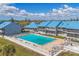 Aerial view of condos and community pool, offering a great waterfront lifestyle at 4410 Warren Ave # 306, Port Charlotte, FL 33953