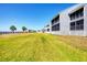 Expansive backyard with well-maintained lawn, perfect for outdoor activities, and stunning waterfront views at 4410 Warren Ave # 306, Port Charlotte, FL 33953