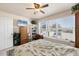 Bright bedroom with natural light from a large window and a ceiling fan at 4410 Warren Ave # 306, Port Charlotte, FL 33953