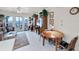Bright living area offering a cozy dining table and a clear view of the beautiful waterfront at 4410 Warren Ave # 306, Port Charlotte, FL 33953