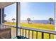 Beautiful outdoor patio featuring views of the water and landscaping at 4410 Warren Ave # 306, Port Charlotte, FL 33953