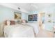 Comfortable bedroom with twin beds, perfect for guests or children at 5000 Gasparilla Rd # 23A, Boca Grande, FL 33921