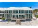 Beautifully designed beach house featuring a white roof, spacious balconies, and easy beach access at 5000 Gasparilla Rd # 23A, Boca Grande, FL 33921