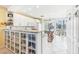Spacious kitchen with custom cabinetry, marble countertops, modern appliances, and ample natural light at 5000 Gasparilla Rd # 23A, Boca Grande, FL 33921