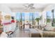 Cozy sun room with ocean views, perfect for relaxing and enjoying the scenery at 5000 Gasparilla Rd # 23A, Boca Grande, FL 33921