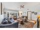 Inviting living room with a ceiling fan, and plenty of natural light at 521 Artists Ave, Englewood, FL 34223