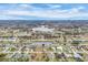 Scenic aerial view of a community with waterfront properties, lakes, and picturesque landscaping at 642 Boundary Blvd, Rotonda West, FL 33947