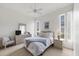 Cozy bedroom with carpet, a dresser and a tv at 642 Boundary Blvd, Rotonda West, FL 33947