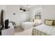 Charming bedroom with two twin beds, closet and a window offering exterior views at 642 Boundary Blvd, Rotonda West, FL 33947