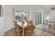Bright dining area with views of the exterior landscape at 642 Boundary Blvd, Rotonda West, FL 33947