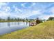 Community lake with dock access at 642 Boundary Blvd, Rotonda West, FL 33947