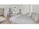 Comfortable main bedroom with carpet flooring, closet, and ensuite bathroom at 642 Boundary Blvd, Rotonda West, FL 33947