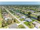Picturesque neighborhood with waterfront properties, each featuring meticulously maintained landscaping and tranquil canals at 68 Long Meadow Ln, Rotonda West, FL 33947