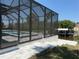 Screened-in lanai with a pool and spa overlooking the serene waterfront, great for relaxing and entertaining at 725 Clearview Dr, Port Charlotte, FL 33953