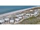 Aerial view of beachside condos with beautiful blue ocean views and lush landscaping at 7470 Palm Island Dr # 2813, Placida, FL 33946