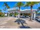 Picturesque entrance to property with charming, tropical-themed architecture, promising a welcoming experience at 7470 Palm Island Dr # 2813, Placida, FL 33946